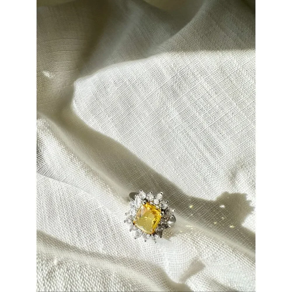 Yellow elongated radiant cut canary cubic zirconia cocktail ring